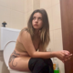 A cute girl with tattoos records herself pissing, farting and taking a shit naturally while sitting on a toilet. She wipes her ass when finished. Presented in 720P HD. About 4 minutes.